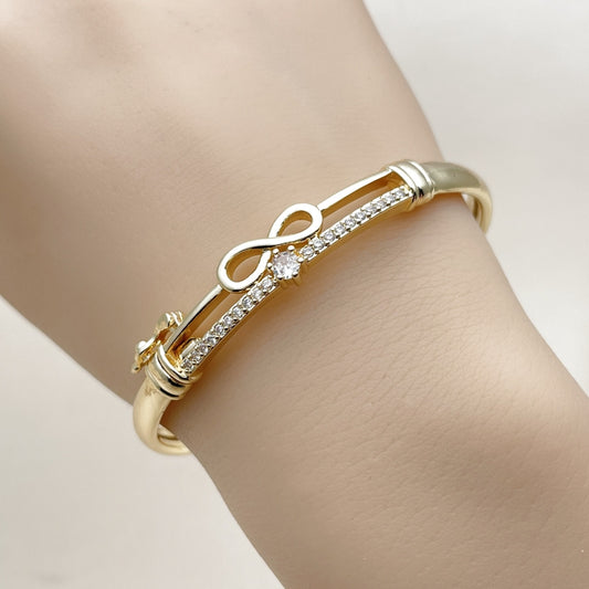 Oro Laminado Individual Bangle, Gold Filled Style Infinite Design, with White Cubic Zirconia, Polished, Golden Finish
