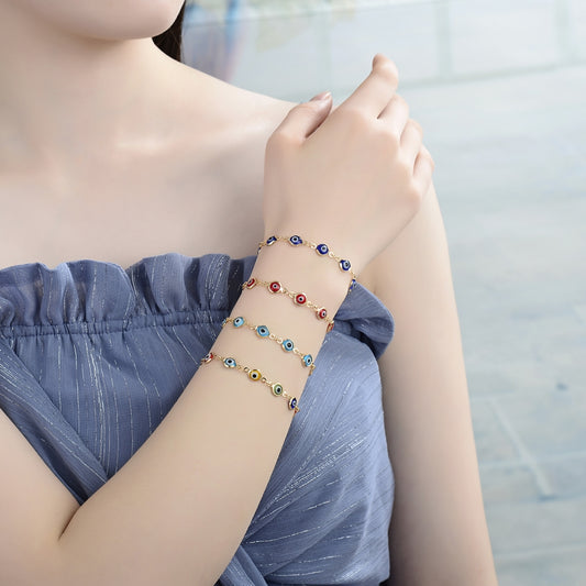 Oro Laminado Fancy Bracelet, Gold Filled Style Evil Eye Design, Acqua Resin Finish, Golden Finish