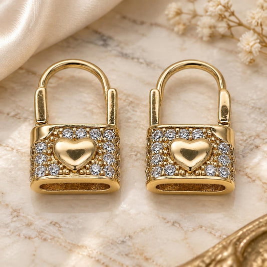 Oro Laminado Huggie Hoop, Gold Filled Style Lock and Heart Design, with White Cubic Zirconia, Polished, Golden Finish