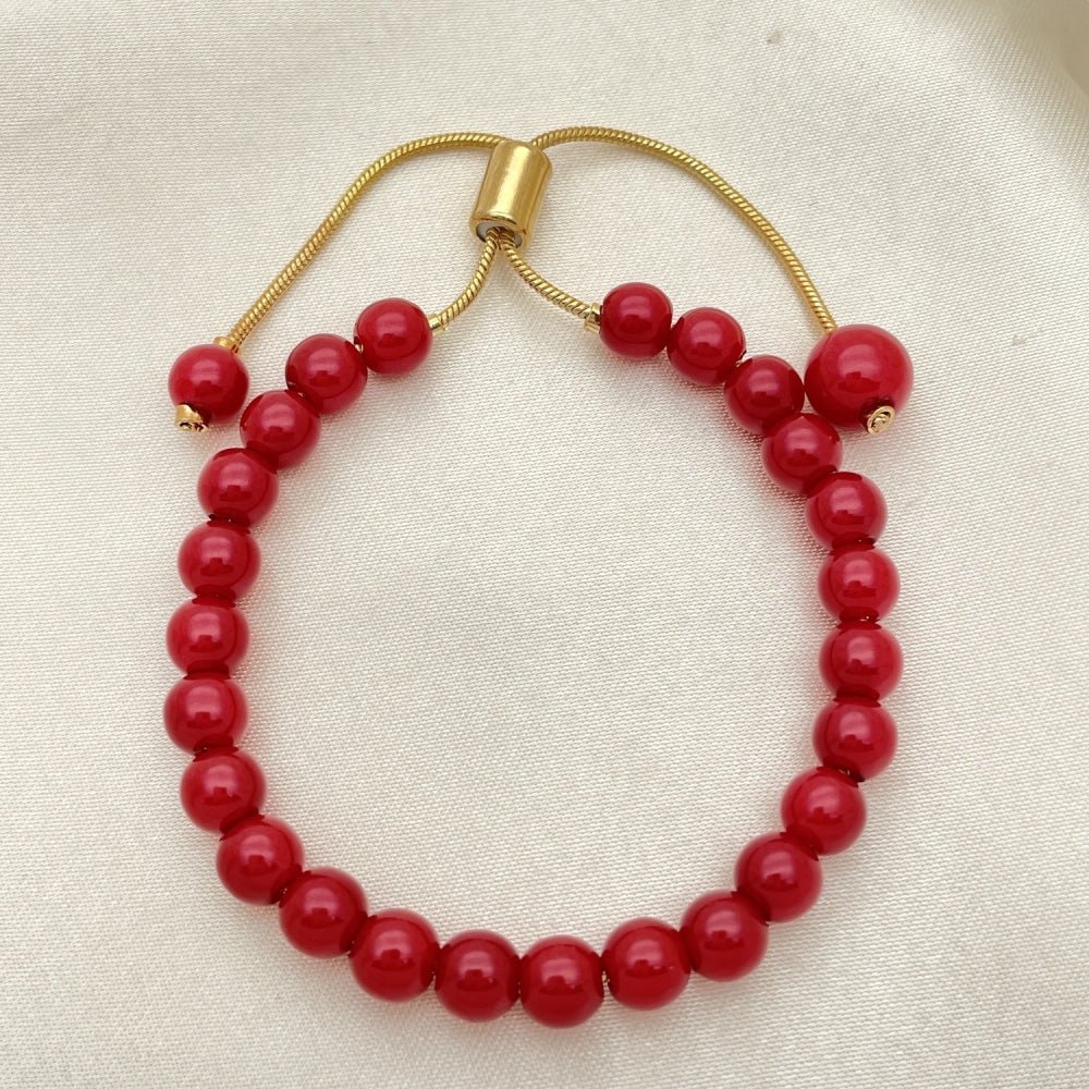 Oro Laminado Adjustable Bolo Bracelet, Gold Filled Style Ball Design, with Garnet Pearl, Polished, Golden Finish