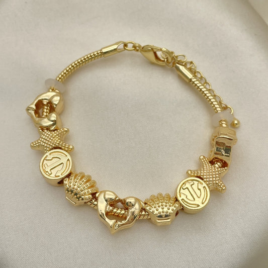 Oro Laminado Fancy Bracelet, Gold Filled Style Dolphin and Shell Design, Polished, Golden Finish