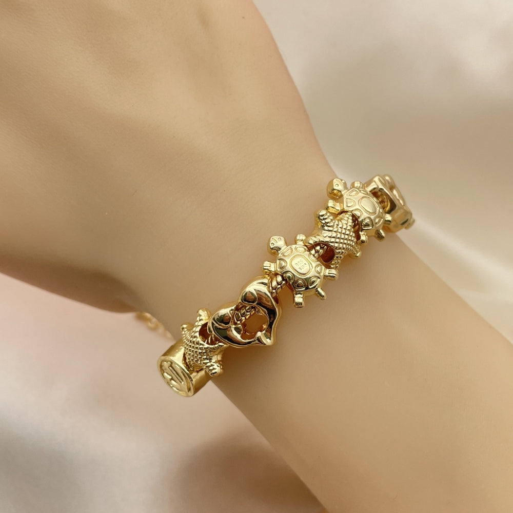 Oro Laminado Fancy Bracelet, Gold Filled Style Star and Turtle Design, Polished, Golden Finish