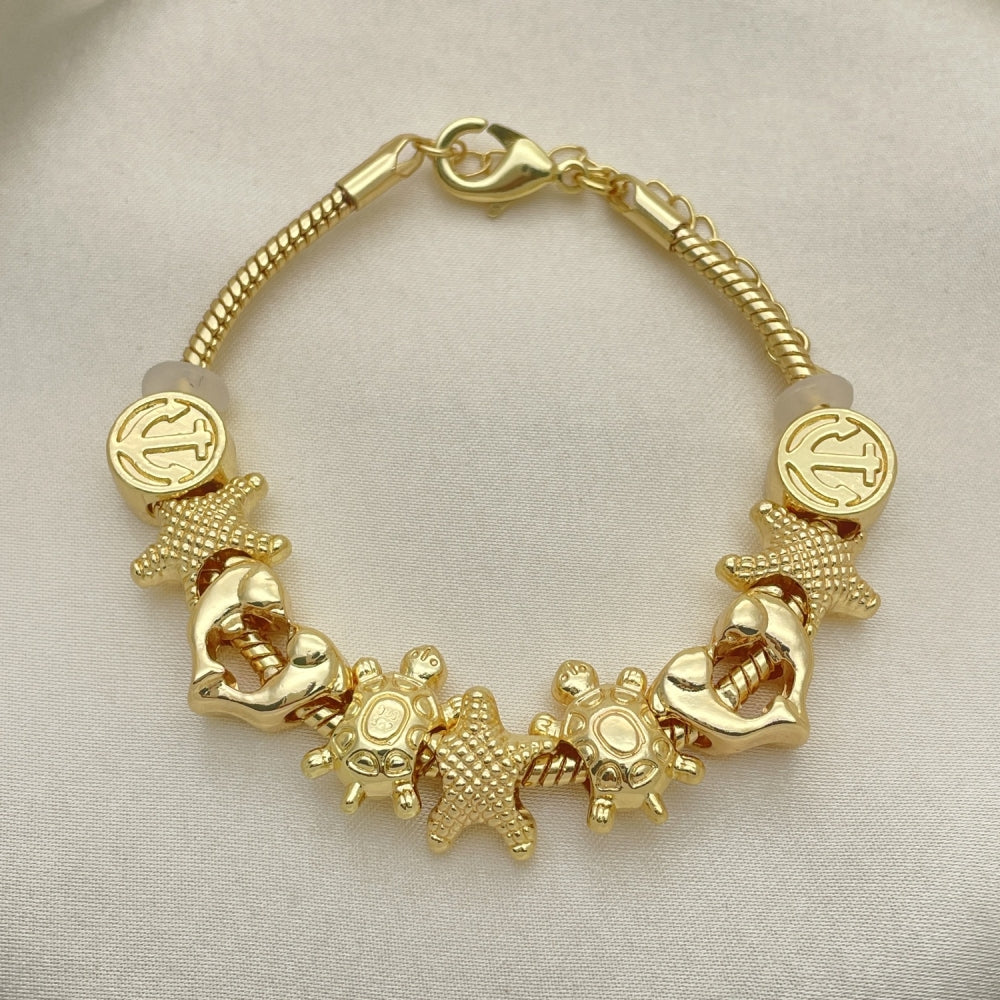 Oro Laminado Fancy Bracelet, Gold Filled Style Star and Turtle Design, Polished, Golden Finish
