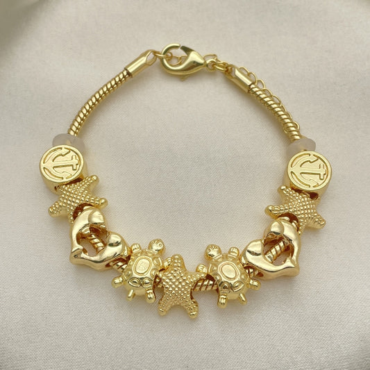 Oro Laminado Fancy Bracelet, Gold Filled Style Star and Turtle Design, Polished, Golden Finish