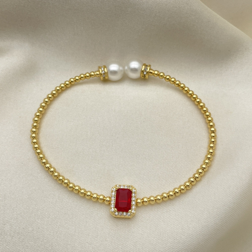 Oro Laminado Individual Bangle, Gold Filled Style Ball Design, with Garnet Cubic Zirconia and Ivory Pearl, Polished, Golden Finish