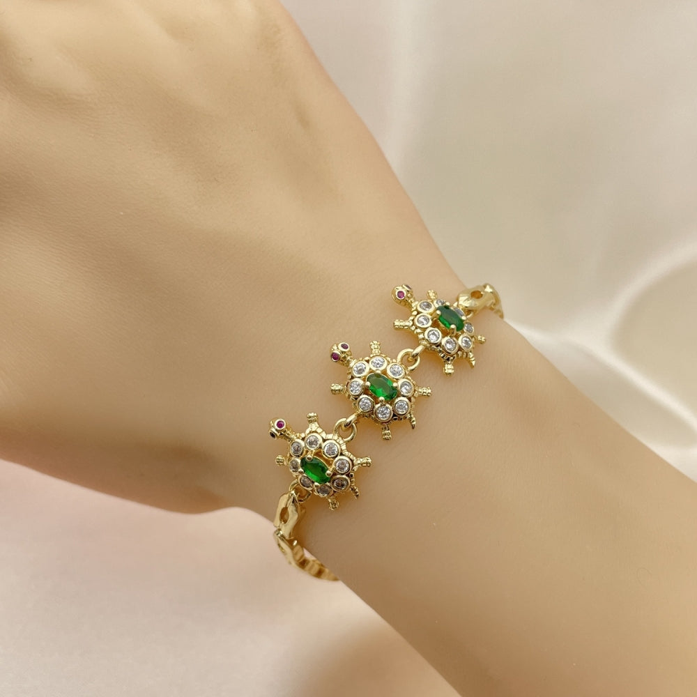 Oro Laminado Fancy Bracelet, Gold Filled Style Turtle and Fish Design, with Green and White Cubic Zirconia, Polished, Golden Finish