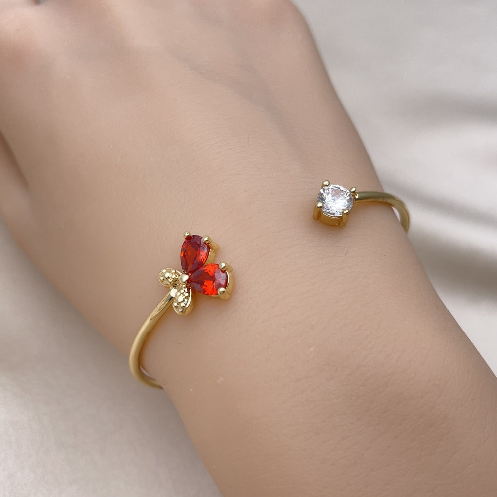 Oro Laminado Individual Bangle, Gold Filled Style Butterfly Design, with Garnet and White Cubic Zirconia, Polished, Golden Finish