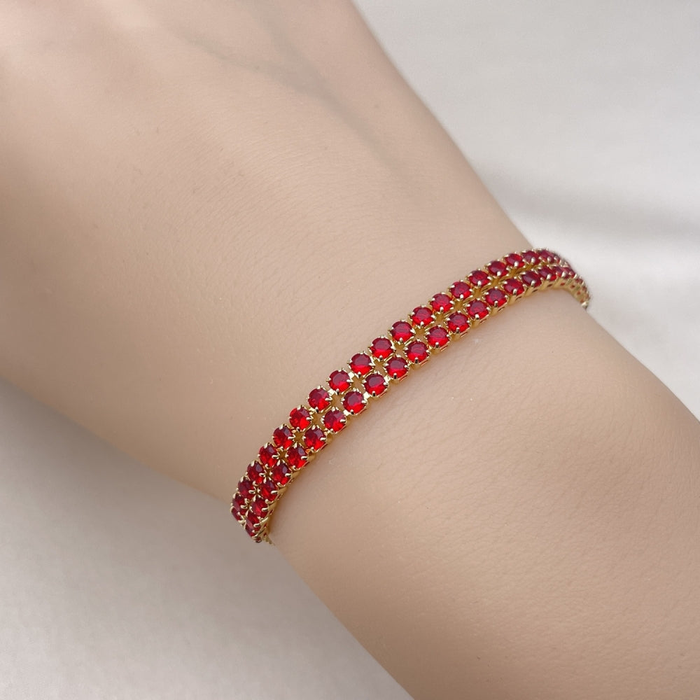 Oro Laminado Adjustable Bolo Bracelet, Gold Filled Style with Garnet Cubic Zirconia, Polished, Golden Finish