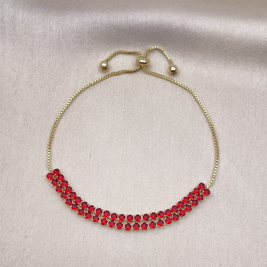 Oro Laminado Adjustable Bolo Bracelet, Gold Filled Style with Garnet Cubic Zirconia, Polished, Golden Finish