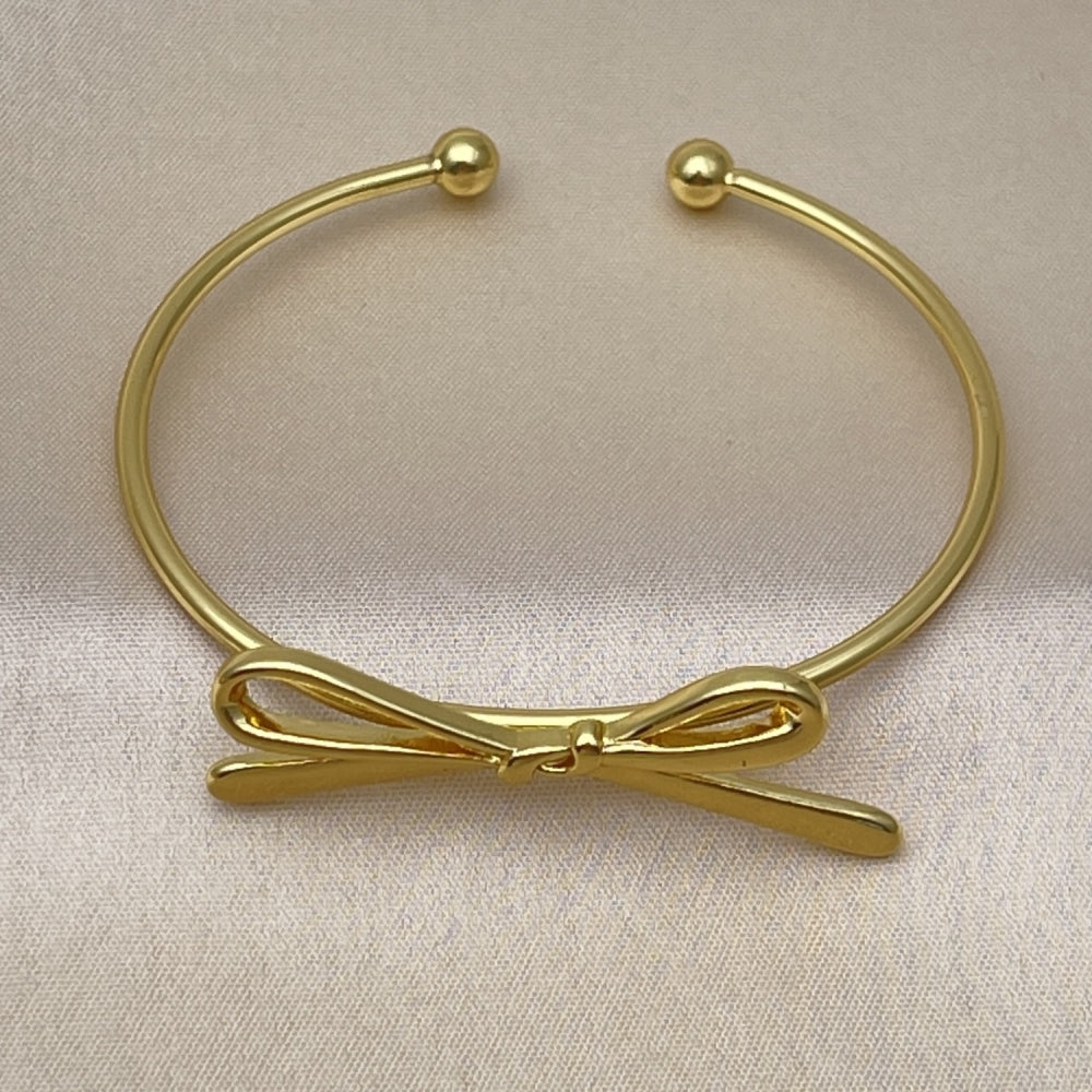 Oro Laminado Individual Bangle, Gold Filled Style Bow Design, Polished, Golden Finish