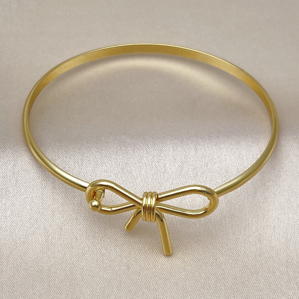 Oro Laminado Individual Bangle, Gold Filled Style Bow Design, Polished, Golden Finish