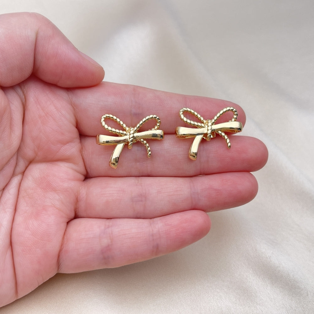 Oro Laminado Stud Earring, Gold Filled Style Bow and Twist Design, Polished, Golden Finish