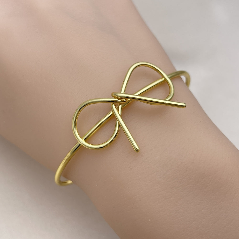Oro Laminado Individual Bangle, Gold Filled Style Bow and Ball Design, Polished, Golden Finish