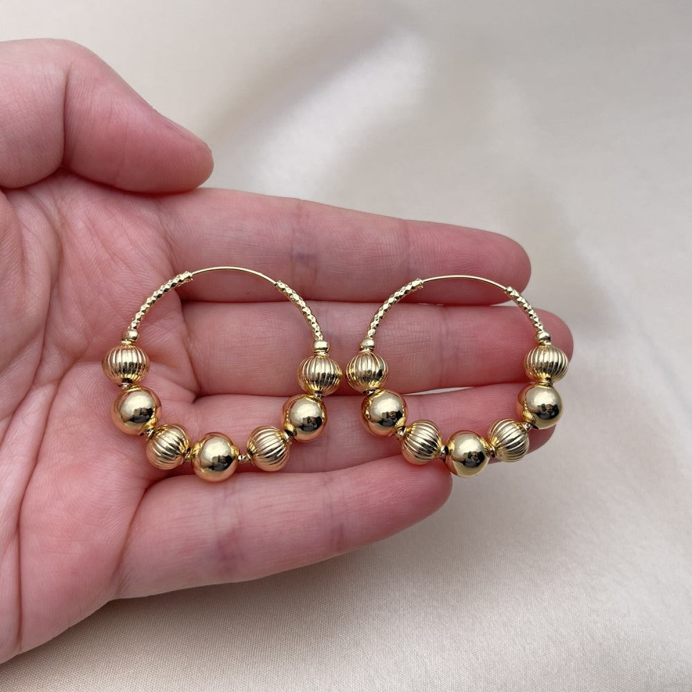 Oro Laminado Medium Hoop, Gold Filled Style Ball and Hollow Design, Diamond Cutting Finish, Golden Finish