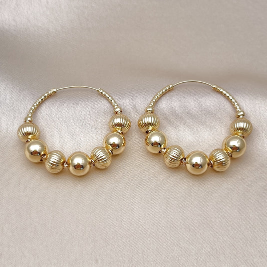 Oro Laminado Medium Hoop, Gold Filled Style Ball and Hollow Design, Diamond Cutting Finish, Golden Finish