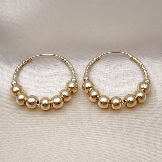 Oro Laminado Medium Hoop, Gold Filled Style Ball and Hollow Design, Polished, Golden Finish