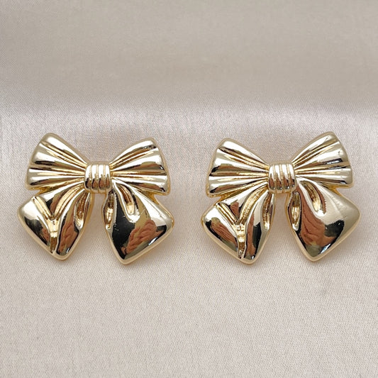 Oro Laminado Stud Earring, Gold Filled Style Bow Design, Polished, Golden Finish