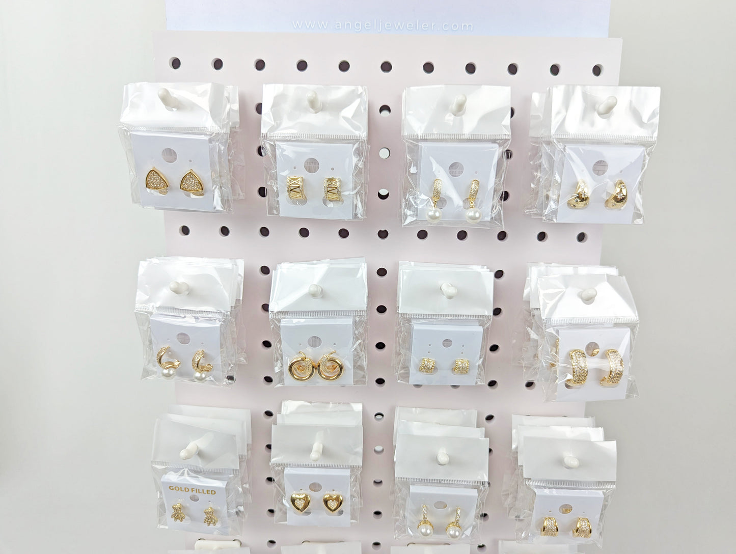 Medium Rotating Display, 160 Assorted Huggies Earrings, Oro Laminado with Free Display