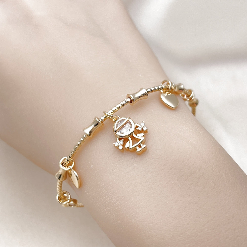 Oro Laminado Individual Bangle, Gold Filled Style Little Girl and Heart Design, with White Cubic Zirconia, Polished, Golden Finish