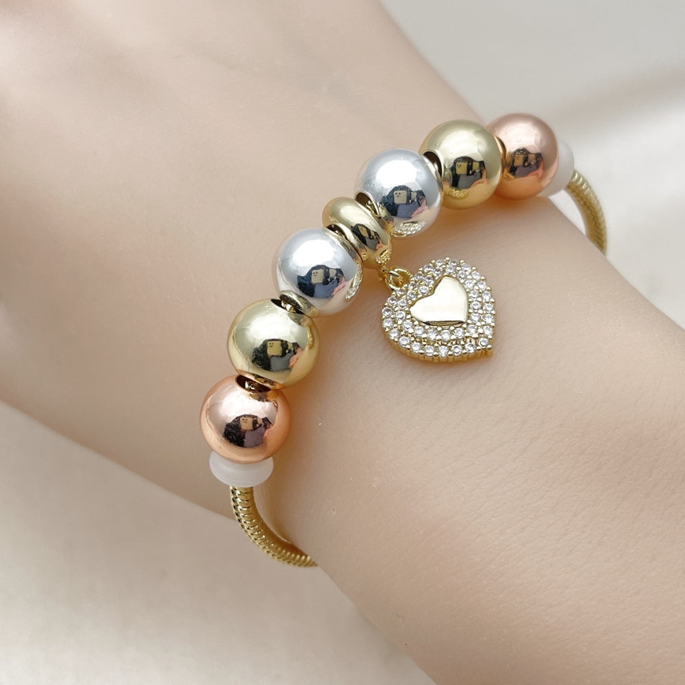 Oro Laminado Fancy Bracelet, Gold Filled Style Heart and Rat Tail Design, with White Cubic Zirconia, Polished, Tricolor