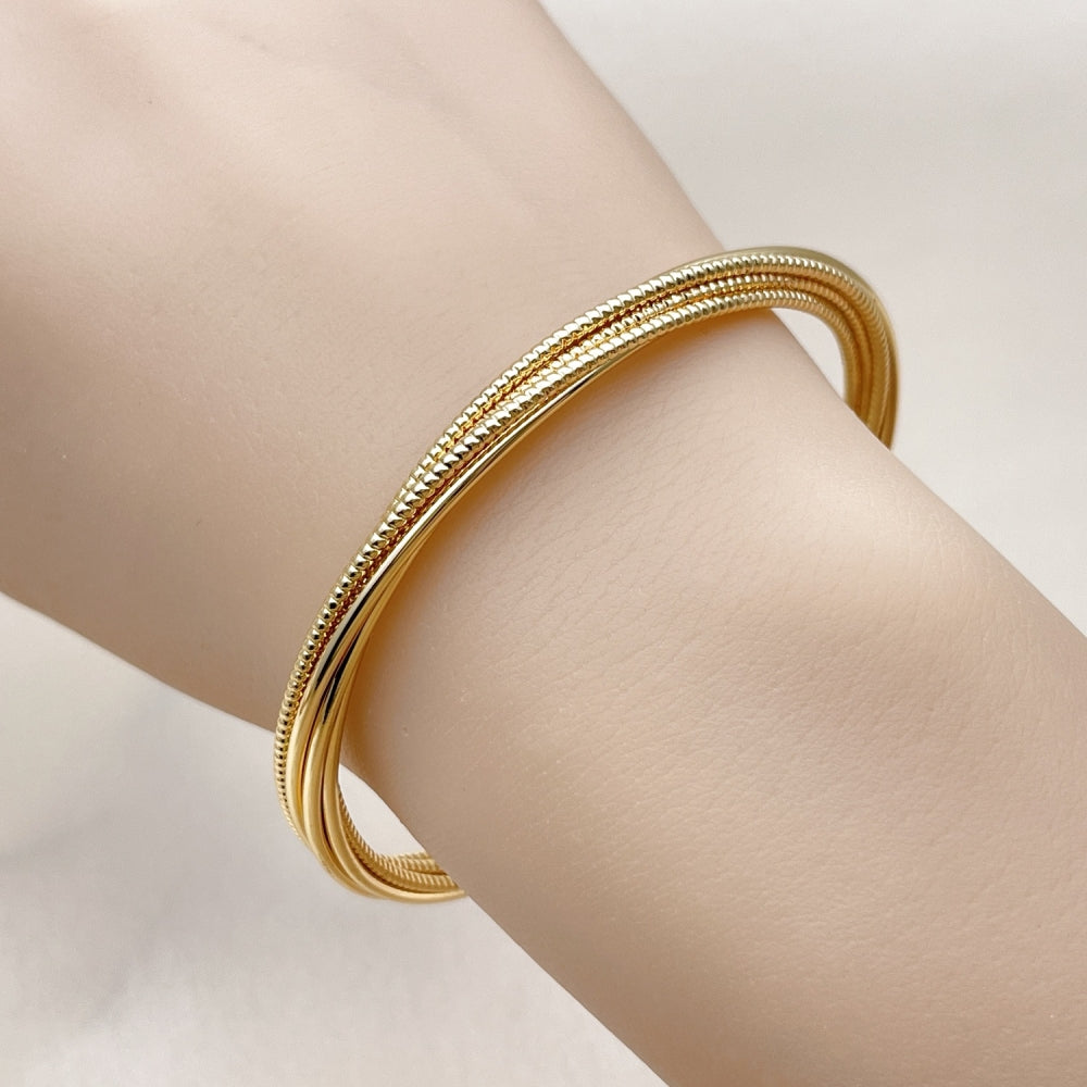 Oro Laminado Individual Bangle, Gold Filled Style Twist Design, Diamond Cutting Finish, Golden Finish