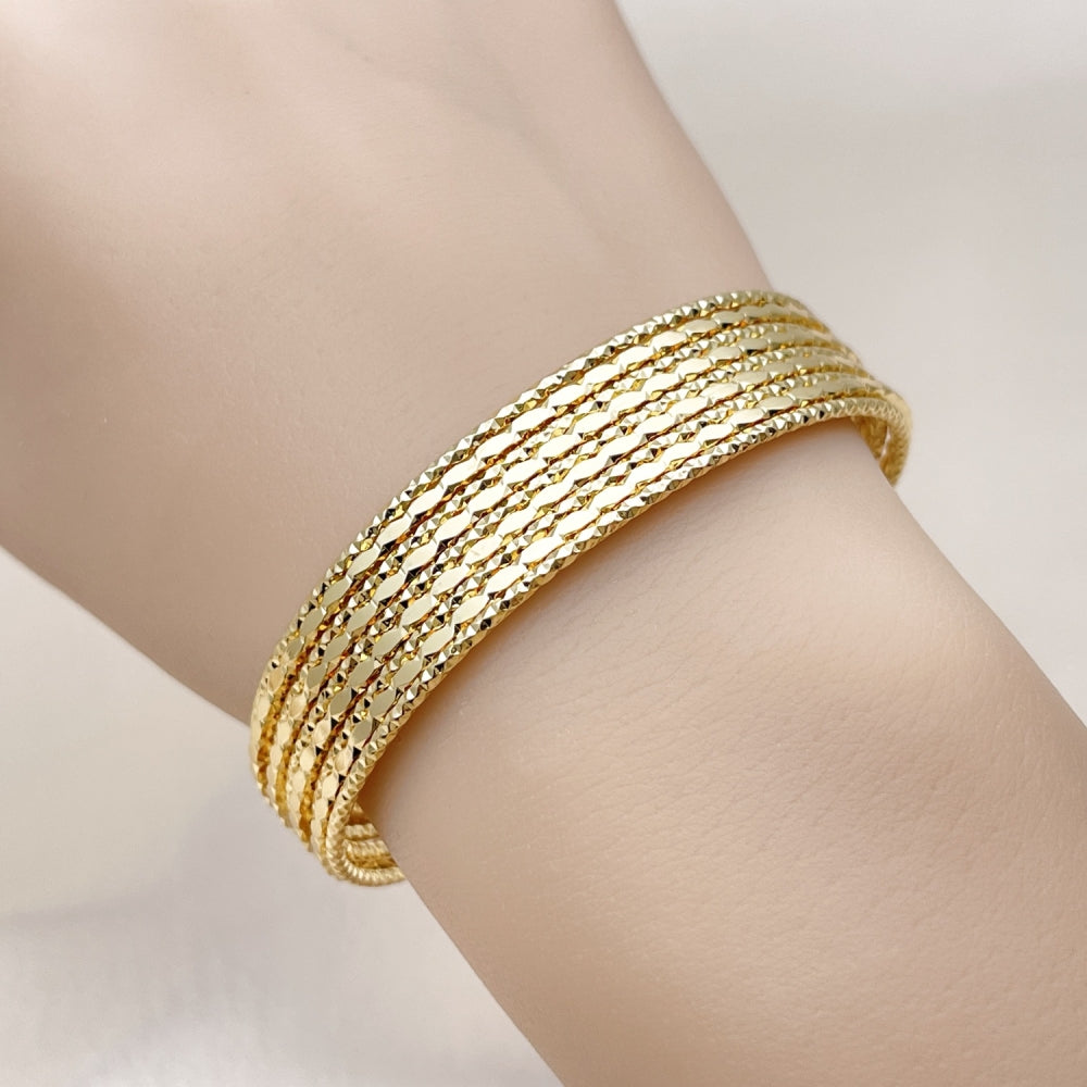 Oro Laminado Individual Bangle, Gold Filled Style Twist Design, Diamond Cutting Finish, Golden Finish