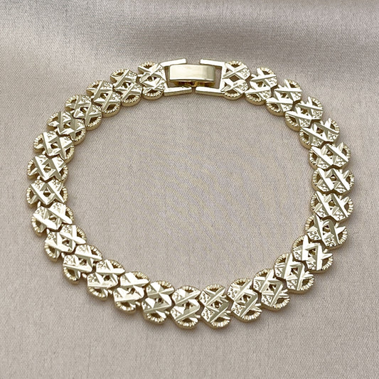 Oro Laminado Solid Bracelet, Gold Filled Style Heart Design, Diamond Cutting Finish, Golden Finish