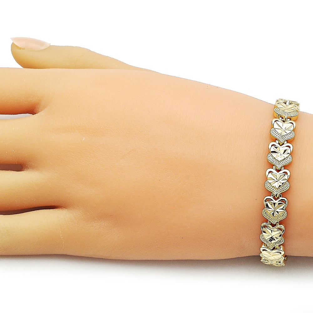 Oro Laminado Solid Bracelet, Gold Filled Style Heart Design, Diamond Cutting Finish, Golden Finish
