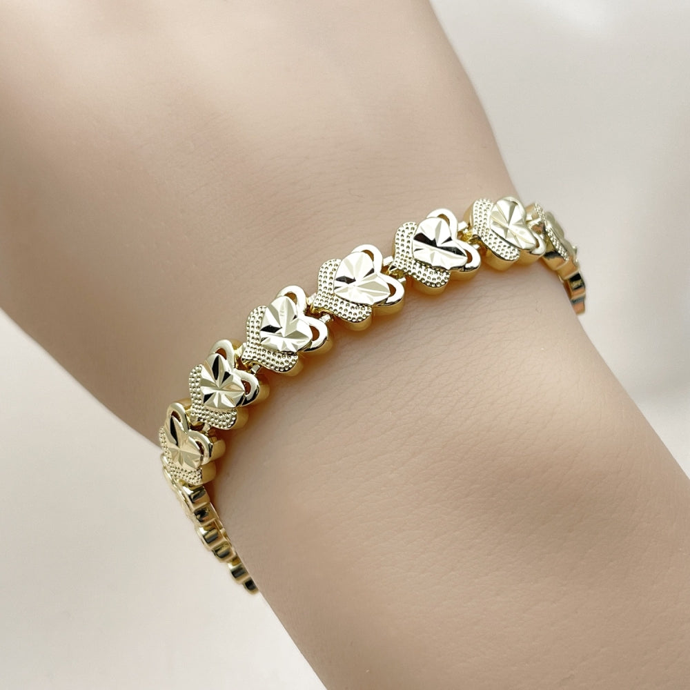 Oro Laminado Solid Bracelet, Gold Filled Style Heart Design, Diamond Cutting Finish, Golden Finish