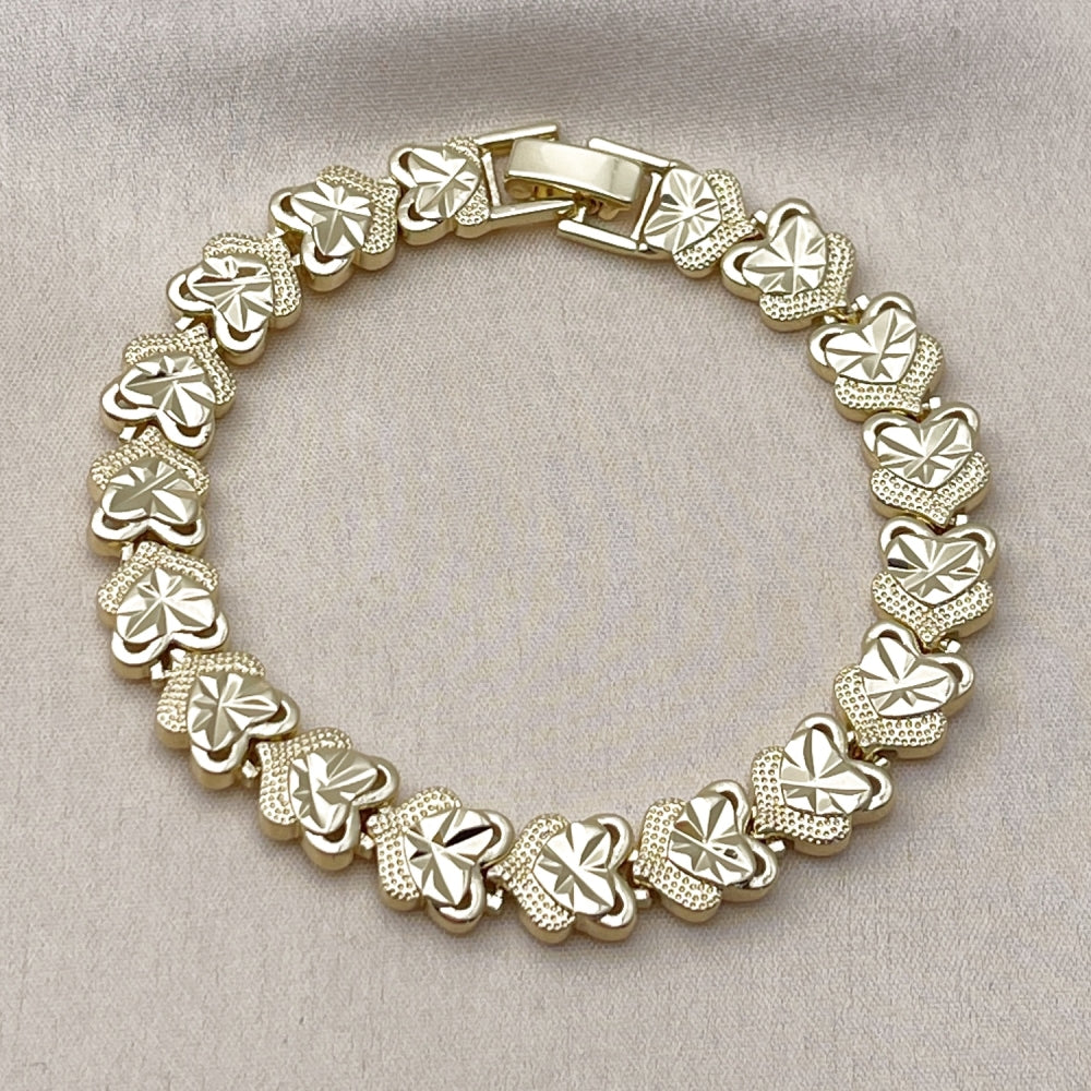 Oro Laminado Solid Bracelet, Gold Filled Style Heart Design, Diamond Cutting Finish, Golden Finish