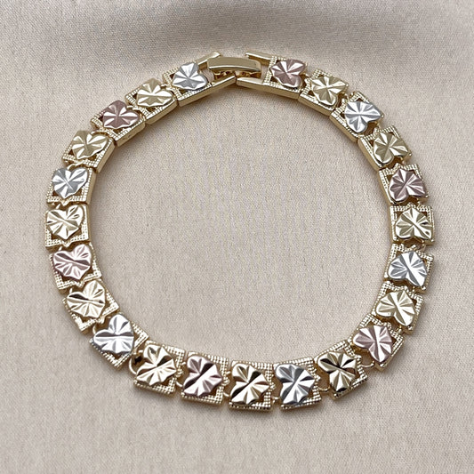 Oro Laminado Solid Bracelet, Gold Filled Style Heart Design, Diamond Cutting Finish, Tricolor