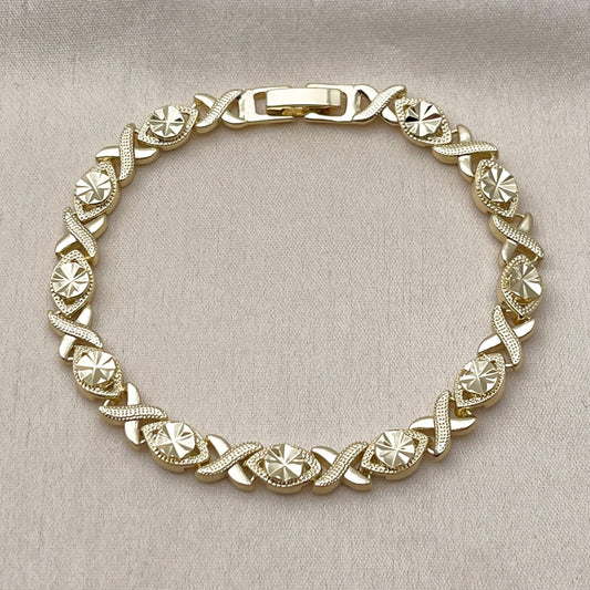 Oro Laminado Solid Bracelet, Gold Filled Style Hugs and Kisses Design, Diamond Cutting Finish, Golden Finish