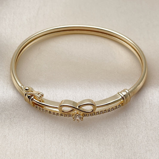 Oro Laminado Individual Bangle, Gold Filled Style Infinite Design, with White Cubic Zirconia, Polished, Golden Finish