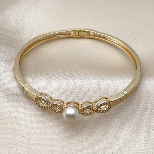 Oro Laminado Individual Bangle, Gold Filled Style Infinite and Ball Design, with White Cubic Zirconia and Ivory Pearl, Polished, Golden Finish