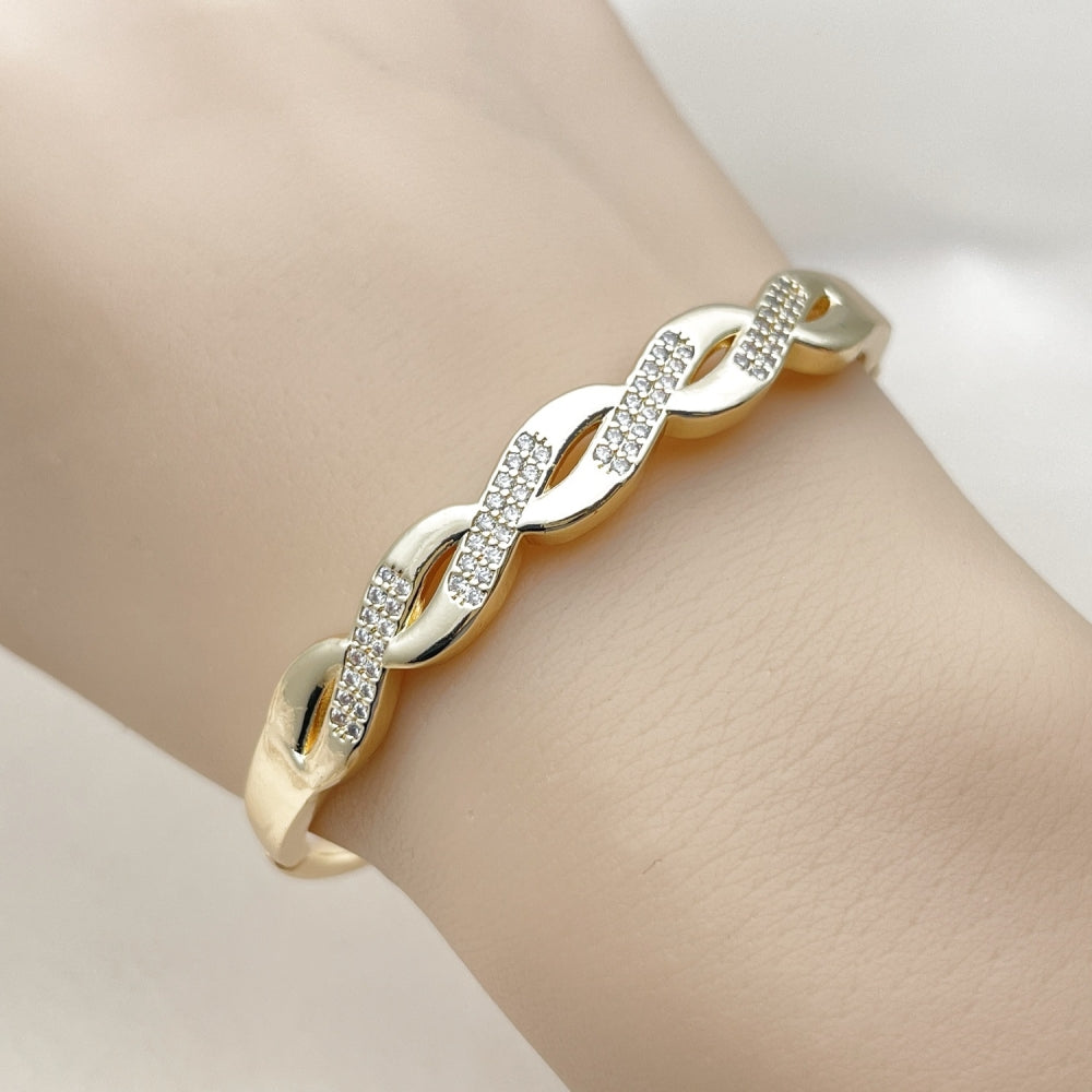 Oro Laminado Individual Bangle, Gold Filled Style Twist Design, with White Cubic Zirconia, Polished, Golden Finish