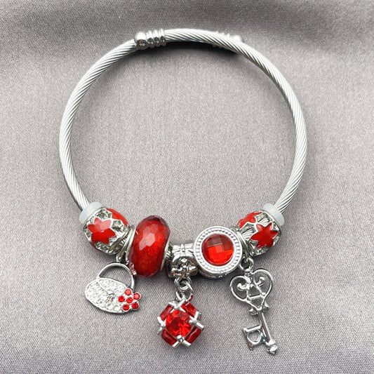 Stainless Steel Individual Bangle, key and Suitecase Design, with Garnet Cubic Zirconia and Light Siam Crystal, Red Enamel Finish, Rhodium Finish